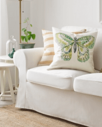 Ikea rotfjaril cushion cover styled on a white sofa