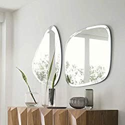 Mirrors placed above console table to enhance wall decor