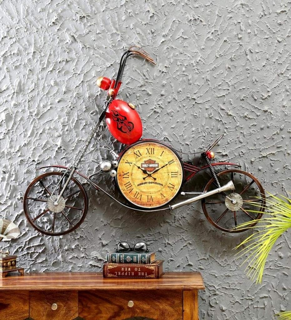Motorcycle shaped wall clock installed on the wall to enhance wall decor