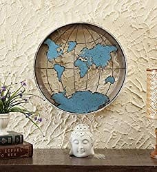 A metal globe installed on wall for decoration