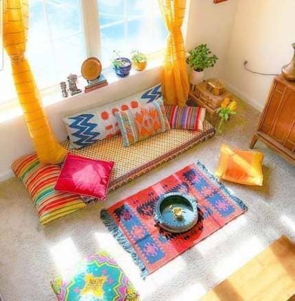 a living room showing boho decor floor seating arrangement
